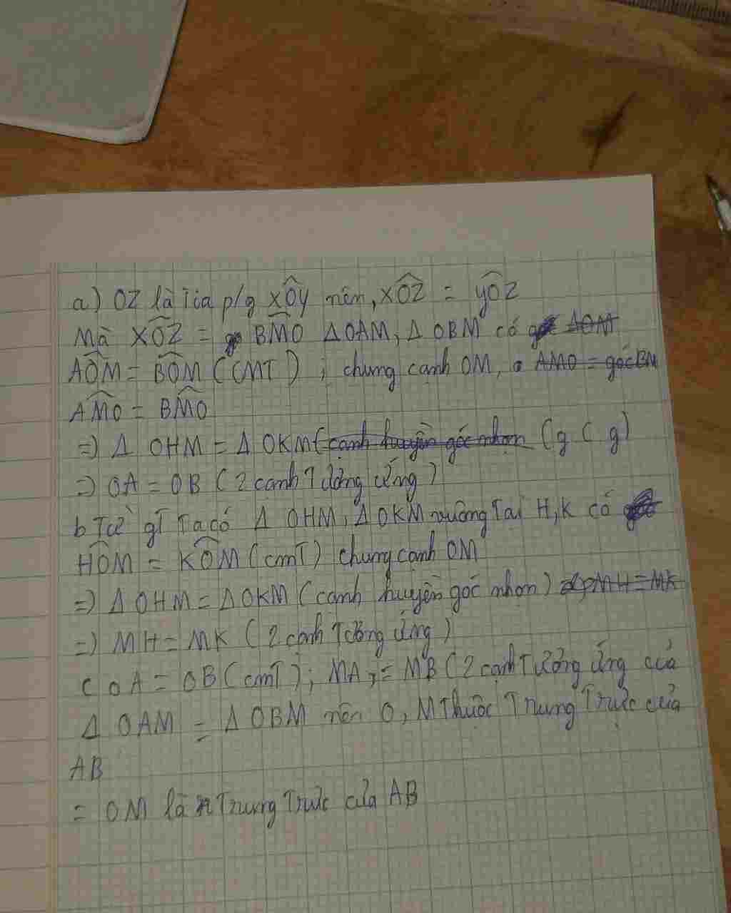 toan-lop-7-cho-goc-nhon-oy-co-oz-la-phan-giac-cua-no-tu-mot-diem-m-tren-tia-oz-ve-mot-duong-than